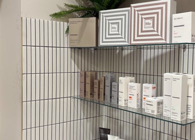 Skincare products displayed on glass shelf at Allure Beauty and Aesthetics, Murray Bridge, South Australia, AU.