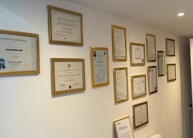 Certificates of excellence at The Bloom Aesthetics, Hereford, England, GB showcasing professional achievements.