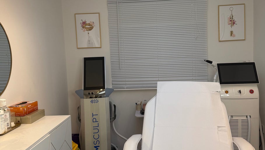 Treatment room at The Bloom Aesthetics in Hereford, England, GB with modern equipment and a relaxation chair.