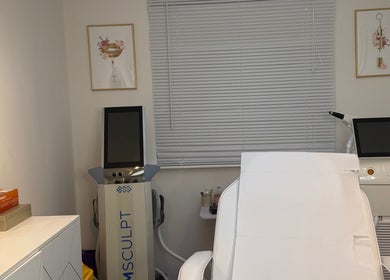 Treatment room at The Bloom Aesthetics in Hereford, England, GB with modern equipment and a relaxation chair.