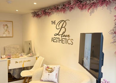 Elegantly decorated reception at The Bloom Aesthetics, Hereford, England, GB, featuring chic floral accents.