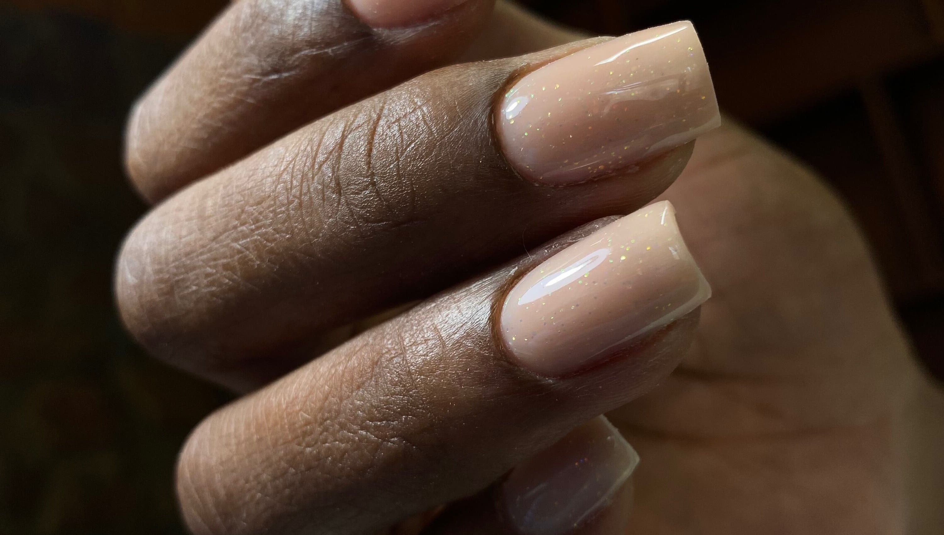 Elegant neutral nails with sparkle at Gels by Mari, Rustenburg, North West, ZA.