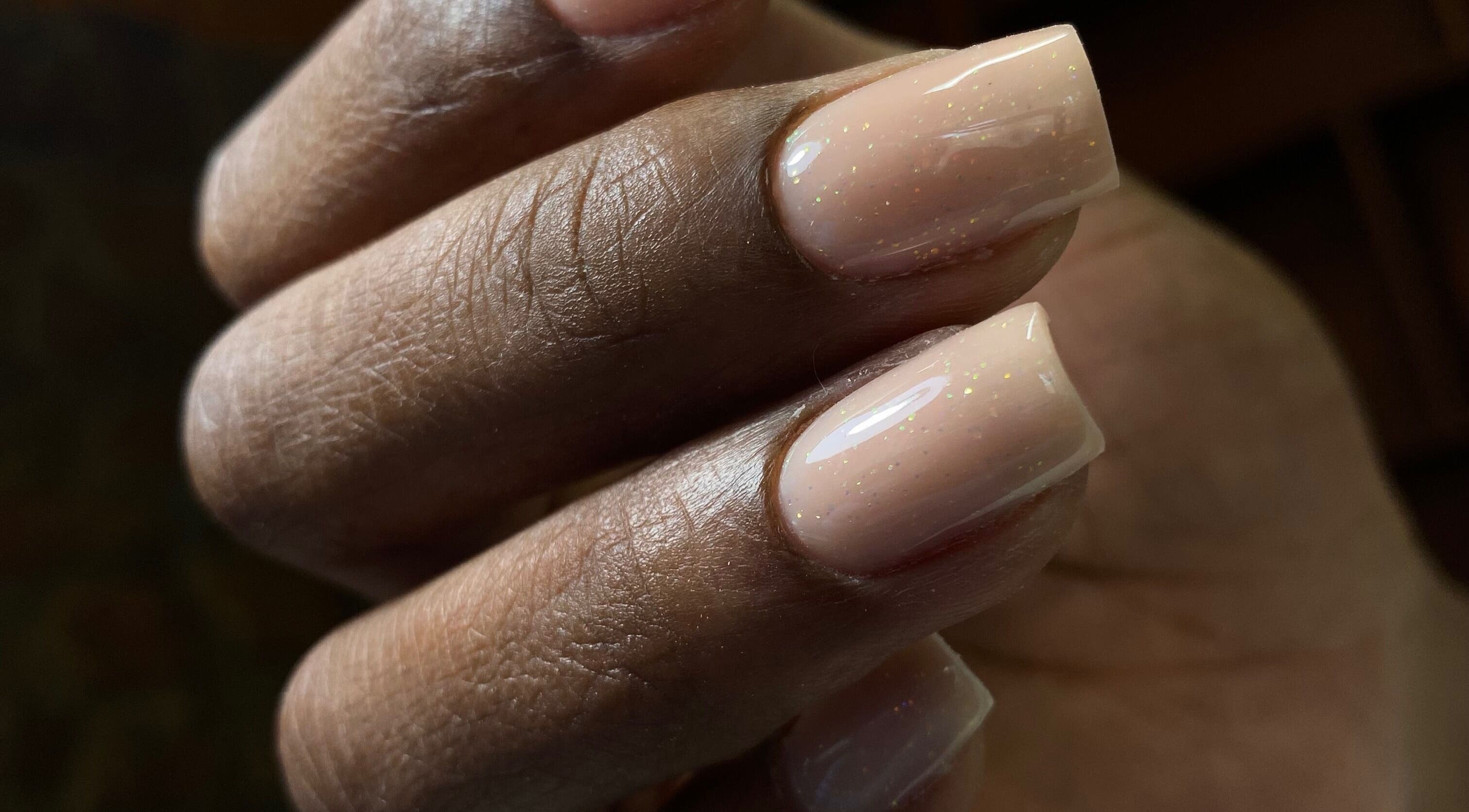 Elegant neutral nails with sparkle at Gels by Mari, Rustenburg, North West, ZA.