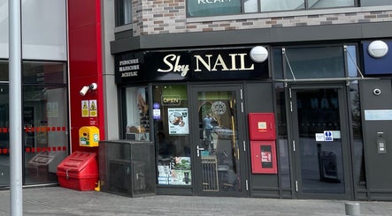 Entrance of Sky Nails, Brentford, England, GB, showcasing modern salon exterior.