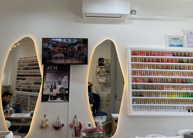 Sky Nails in Brentford, England offers a vibrant nail polish selection displayed on a modern wall.