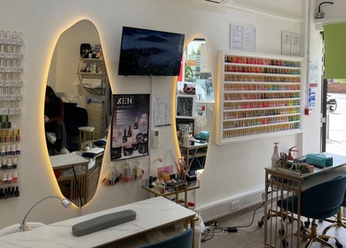 Elegant interior of Sky Nails in Brentford, England, GB showcasing extensive nail polish collection.