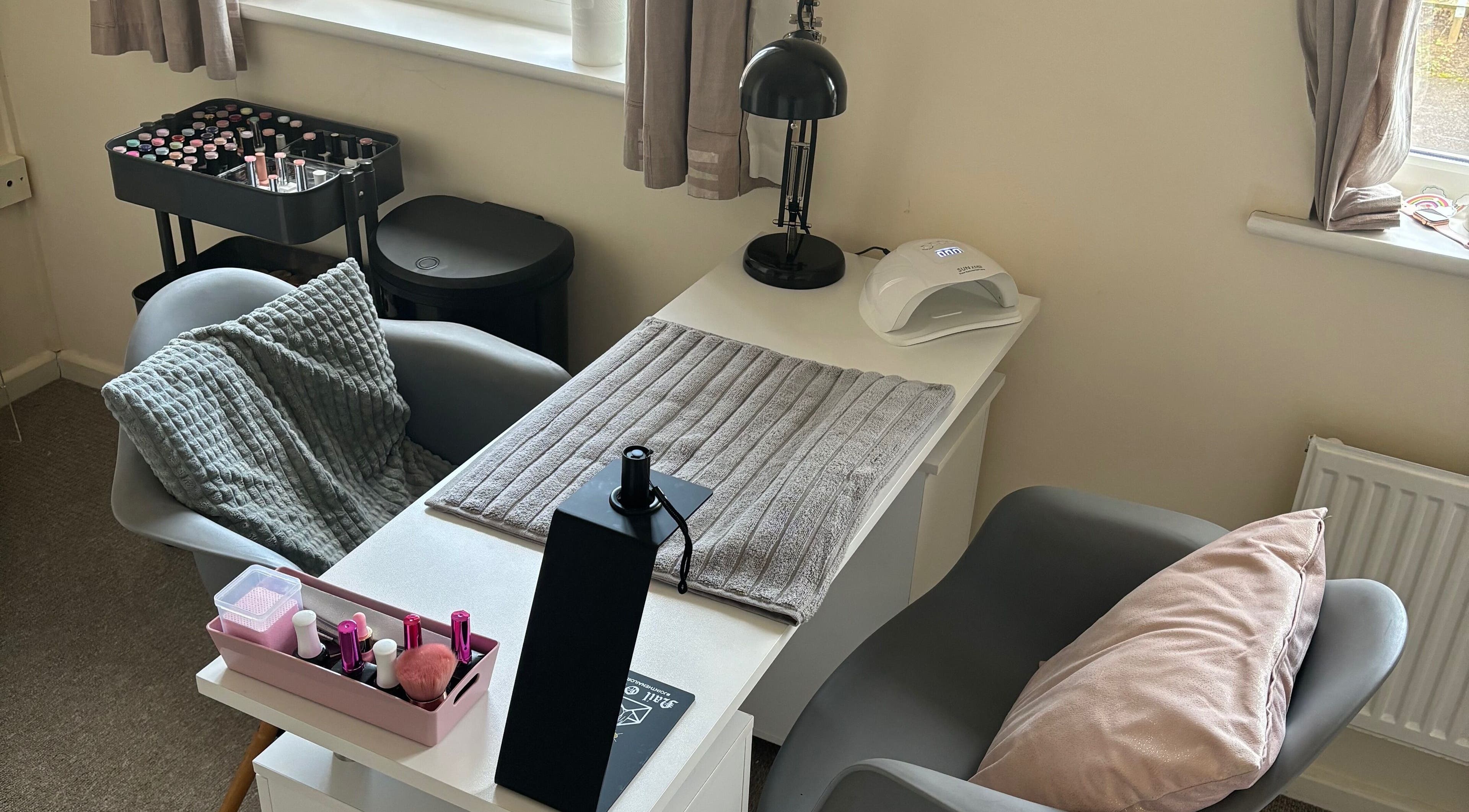 Cozy nail station at Nailsbyebonyy in Rainham, England, GB, offering a relaxing manicure experience.