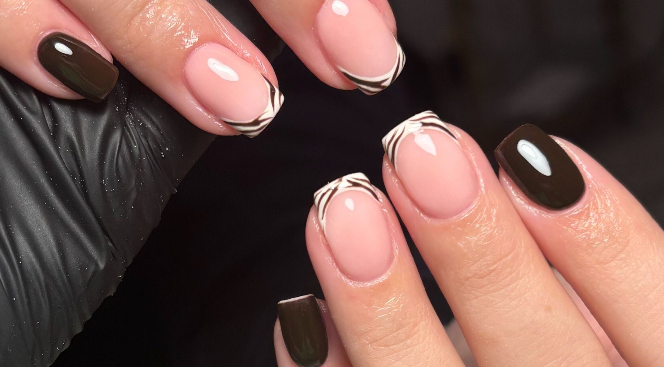 Elegant zebra and dark nail design at Nailed it. by Libby Randall, Rugeley, England, GB.