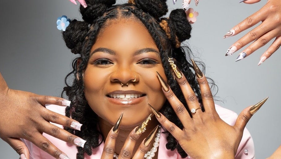 Diverse nail designs displayed at Nat Thee Nailtech in Pensacola, Florida, US showcasing creativity.