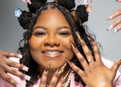 Diverse nail designs displayed at Nat Thee Nailtech in Pensacola, Florida, US showcasing creativity.