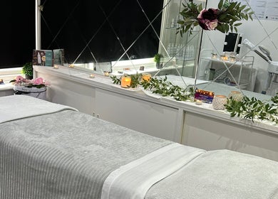 Tranquil treatment room at Divine Touch, Wolverhampton, England, GB, featuring elegant décor and ambient lighting.