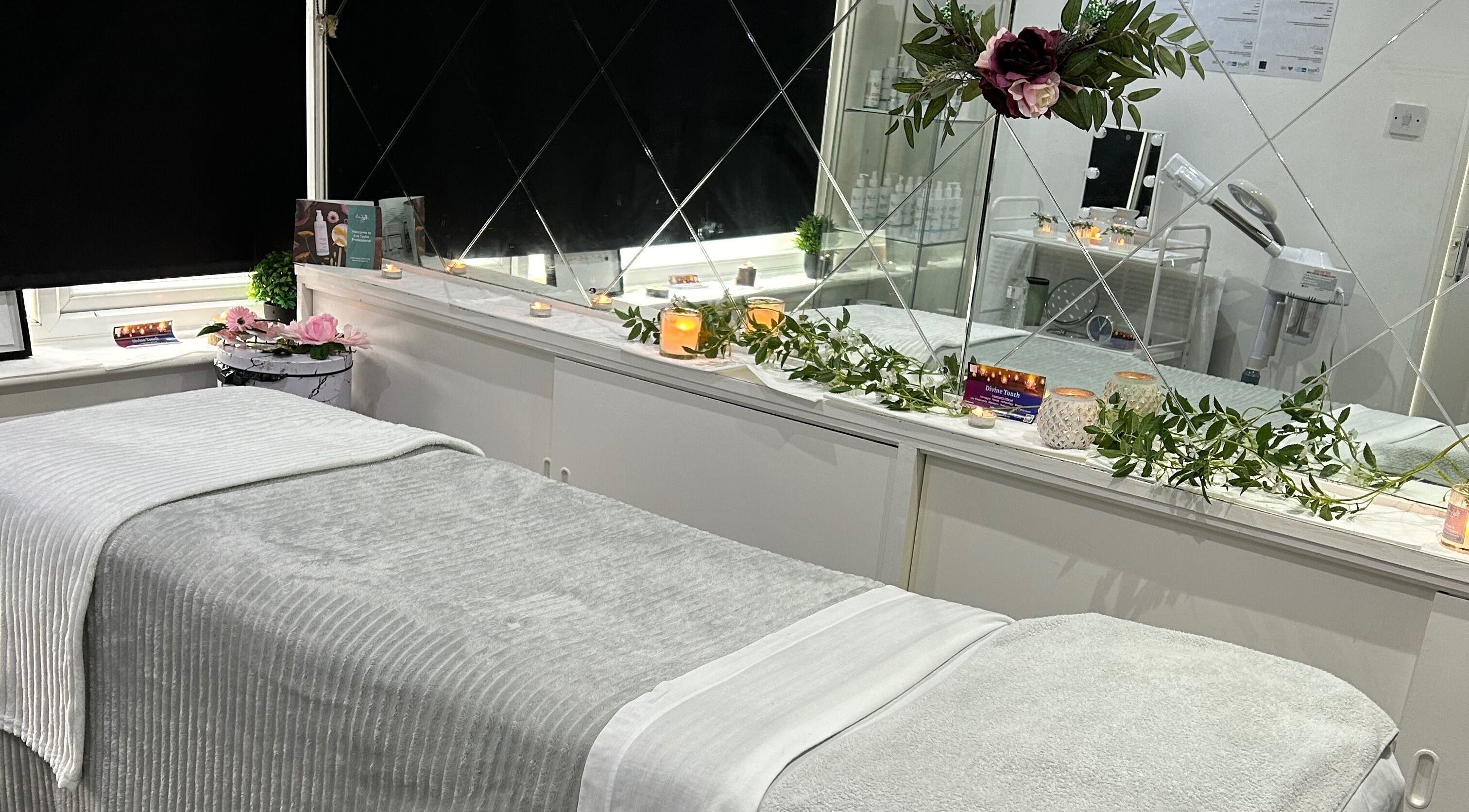 Tranquil treatment room at Divine Touch, Wolverhampton, England, GB, featuring elegant décor and ambient lighting.