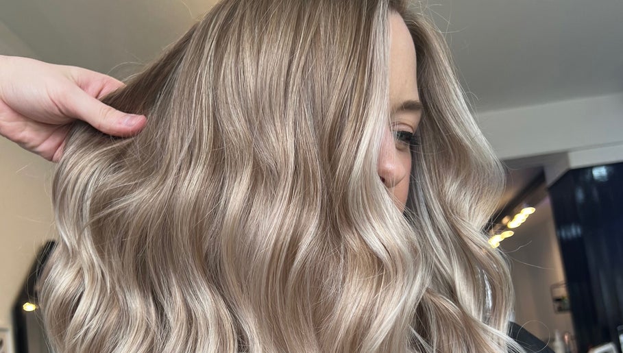 Close-up of shiny blonde waves at Blended Hair Collective, Harrogate, England, GB.