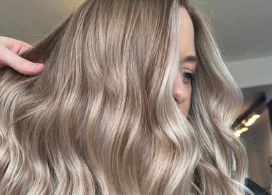 Close-up of shiny blonde waves at Blended Hair Collective, Harrogate, England, GB.