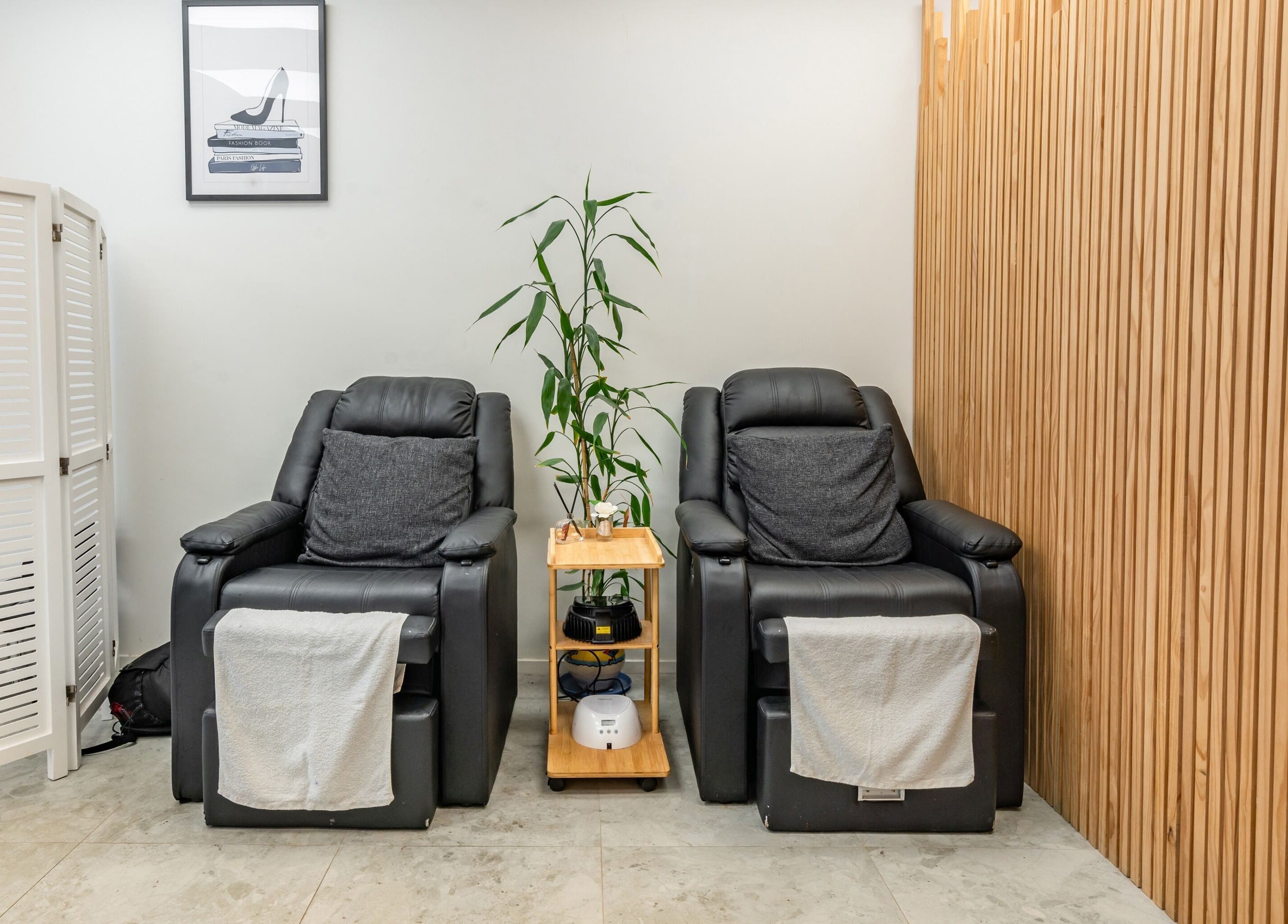 Comfortable massage chairs at Flutter & Co, Auckland, Auckland, NZ, offering a tranquil spa experience.