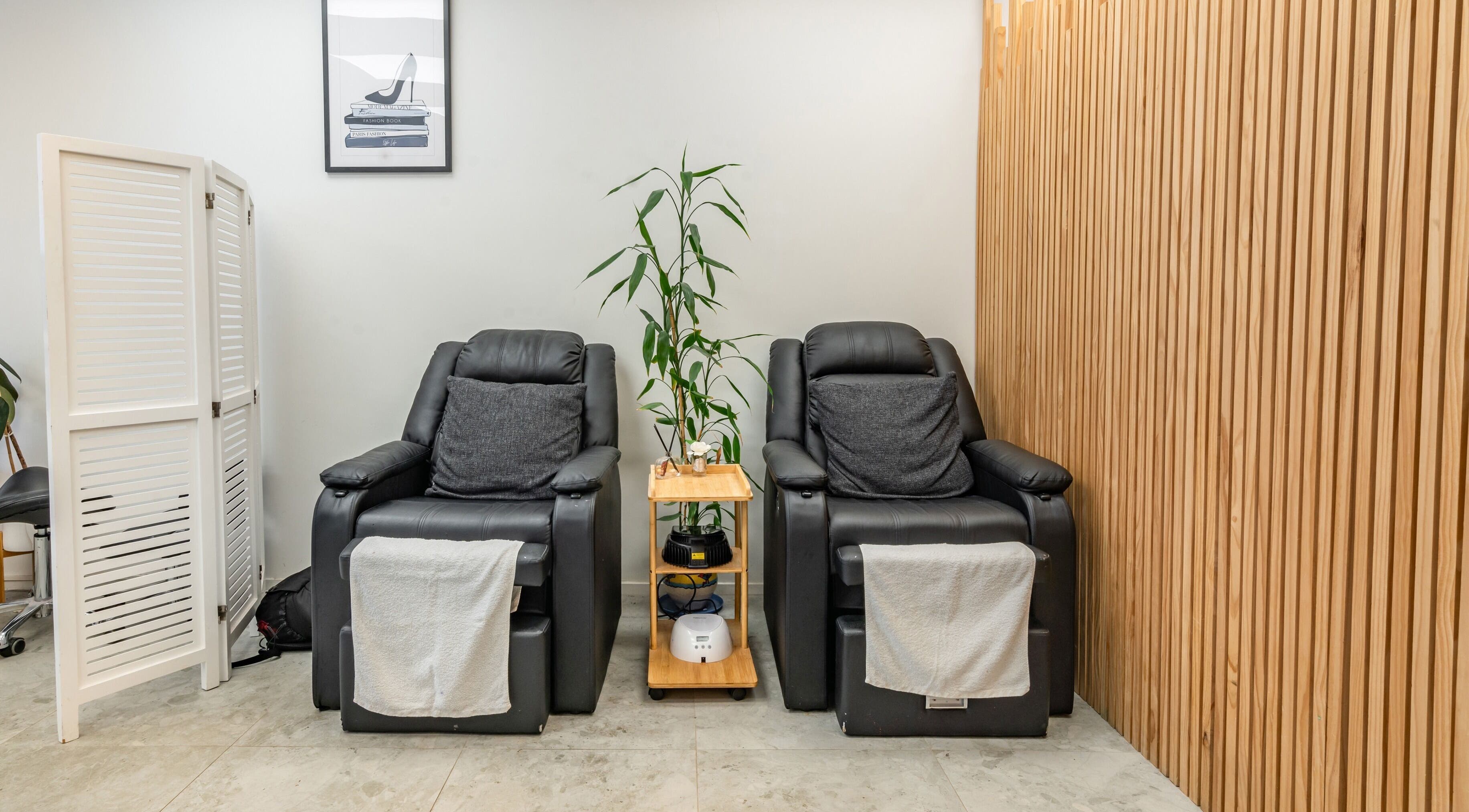 Comfortable massage chairs at Flutter & Co, Auckland, Auckland, NZ, offering a tranquil spa experience.
