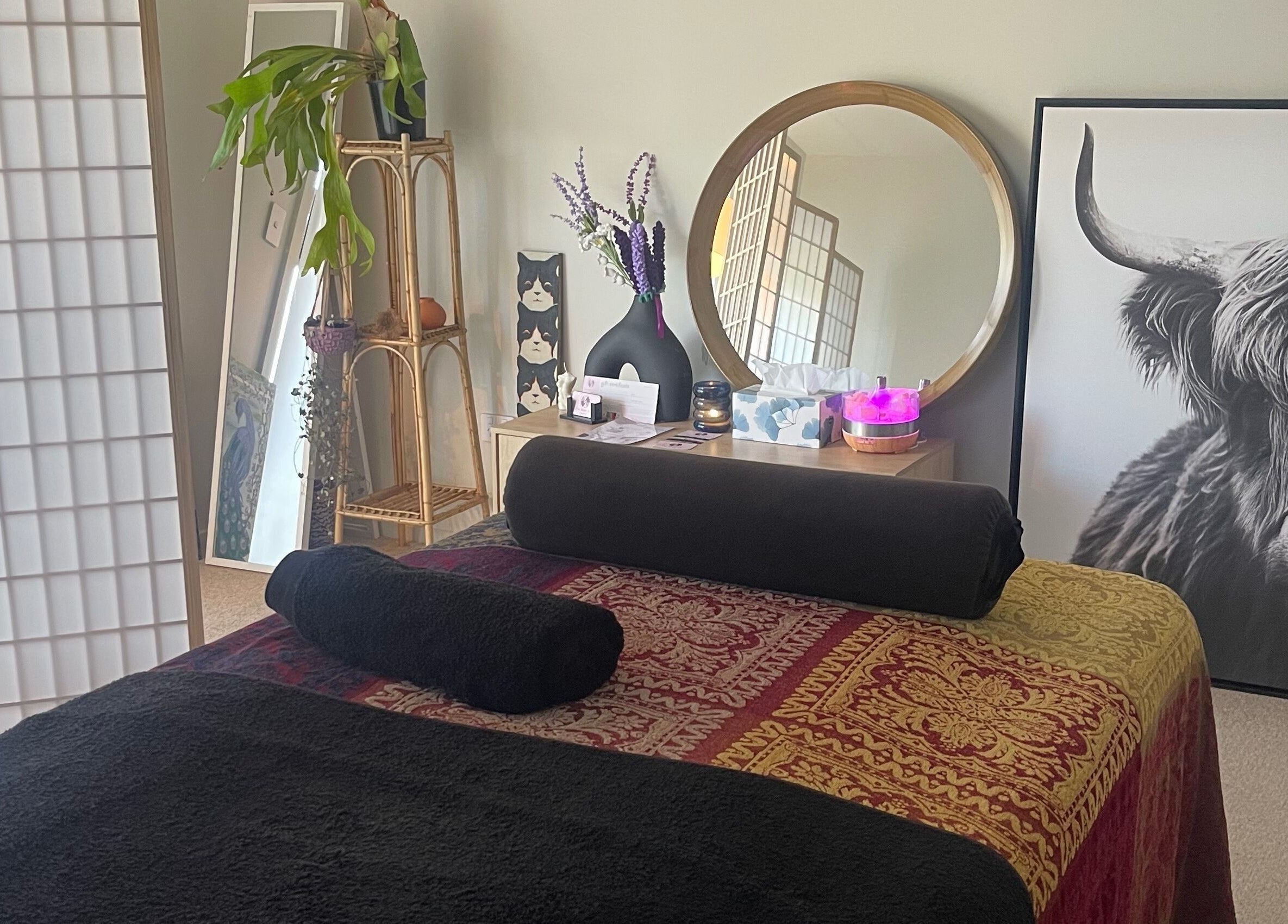 Relaxing therapy room at The Body Lab, Richmond, Tasman Region, NZ with massage bed and decor.