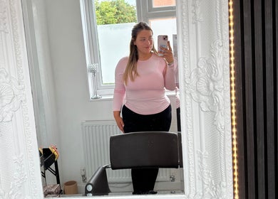 Stylish salon interior at The hairstyle by Lou, Ilkeston, England, GB, featuring elegant mirror and chair setup.