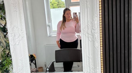 Stylish salon interior at The hairstyle by Lou, Ilkeston, England, GB, featuring elegant mirror and chair setup.