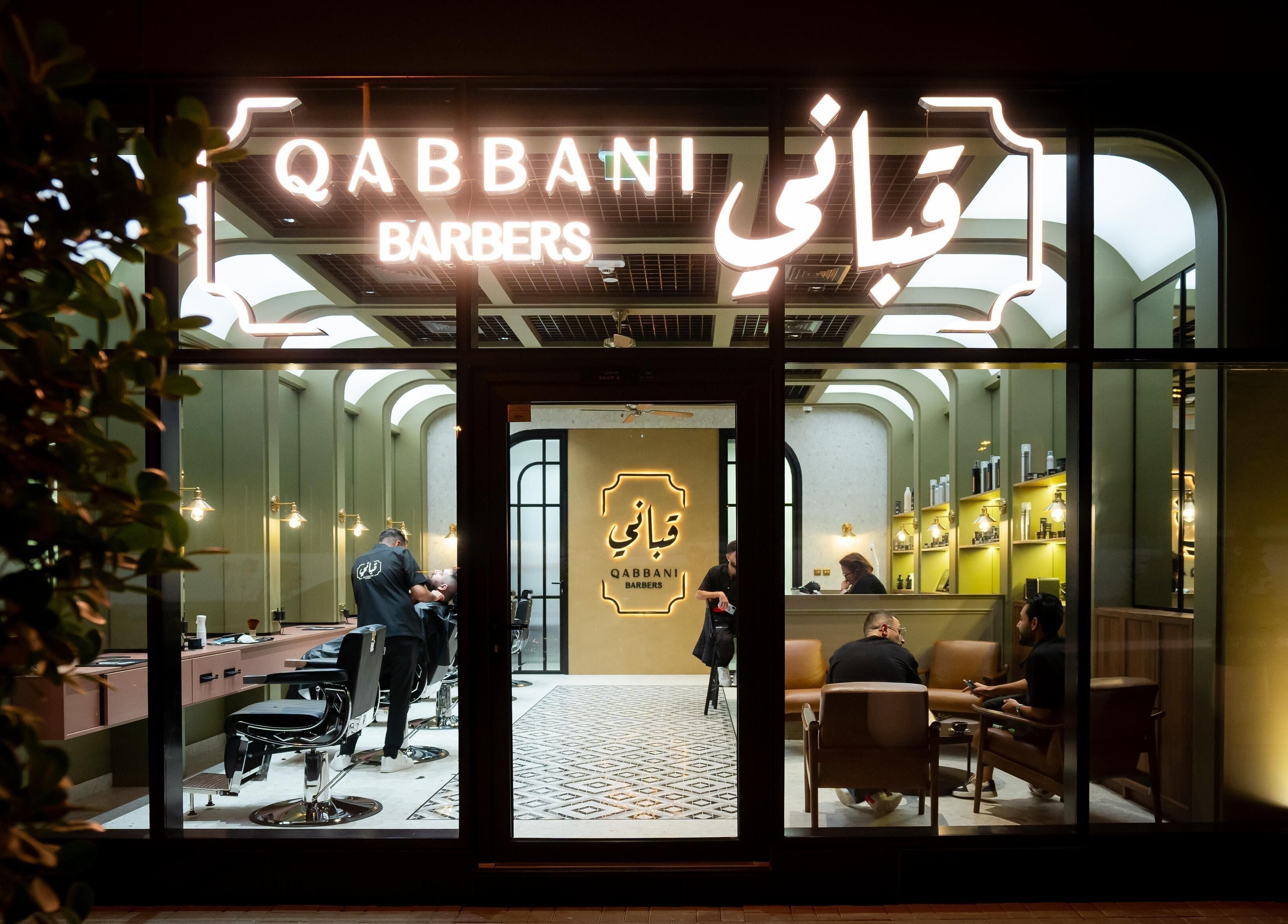 Exterior view of Qabbani Barbers in Dubai, Dubai, AE displaying stylish interior and welcoming ambiance.