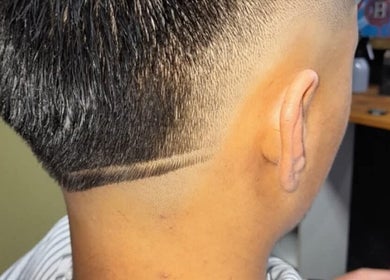 Close-up of a stylish fade haircut at MAUI BARBERS ROTORUA, Rotorua, Bay Of Plenty, NZ.