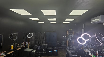 Modern interior of MAUI BARBERS ROTORUA in Rotorua, Bay Of Plenty, NZ with sleek chairs and bright lighting.