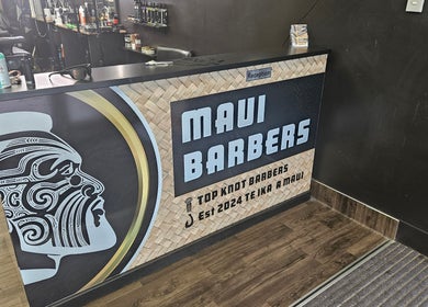 Reception desk at MAUI BARBERS ROTORUA, Rotorua, Bay Of Plenty, NZ, with traditional Maori design.