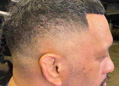 Close-up of a stylish men's fade haircut at MAUI BARBERS ROTORUA, Rotorua, Bay Of Plenty, NZ.