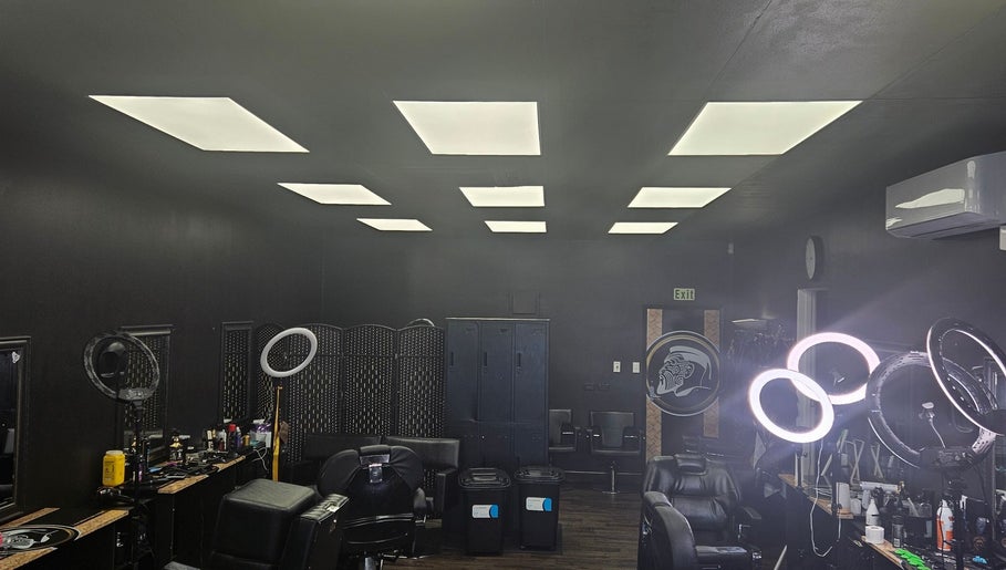 Modern interior at Maui Barbers Rotorua, Rotorua, Bay Of Plenty, NZ, showcasing sleek barber chairs and bright lighting.