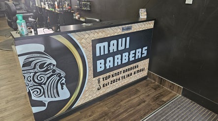 Reception desk at Maui Barbers Rotorua, featuring Maori-inspired design, Rotorua, Bay Of Plenty, NZ.