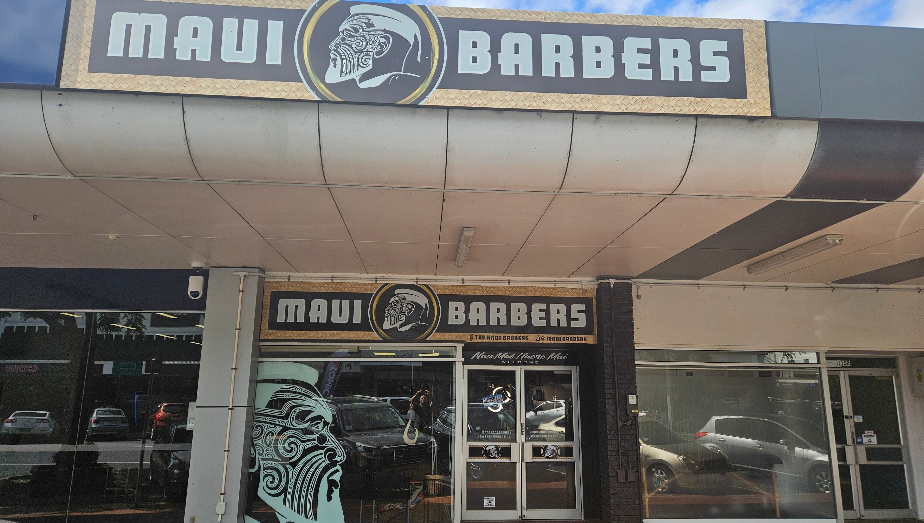 Front view of Maui Barbers Rotorua, located in Rotorua, Bay Of Plenty, NZ, featuring bold signage.