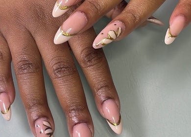 Elegant nail art with gold accents at Define Artistry Nail Bar, Gqeberha, Eastern Cape, ZA.
