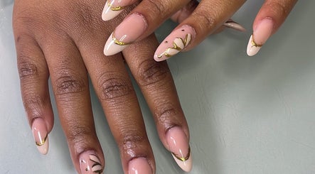 Elegant nail art with gold accents at Define Artistry Nail Bar, Gqeberha, Eastern Cape, ZA.