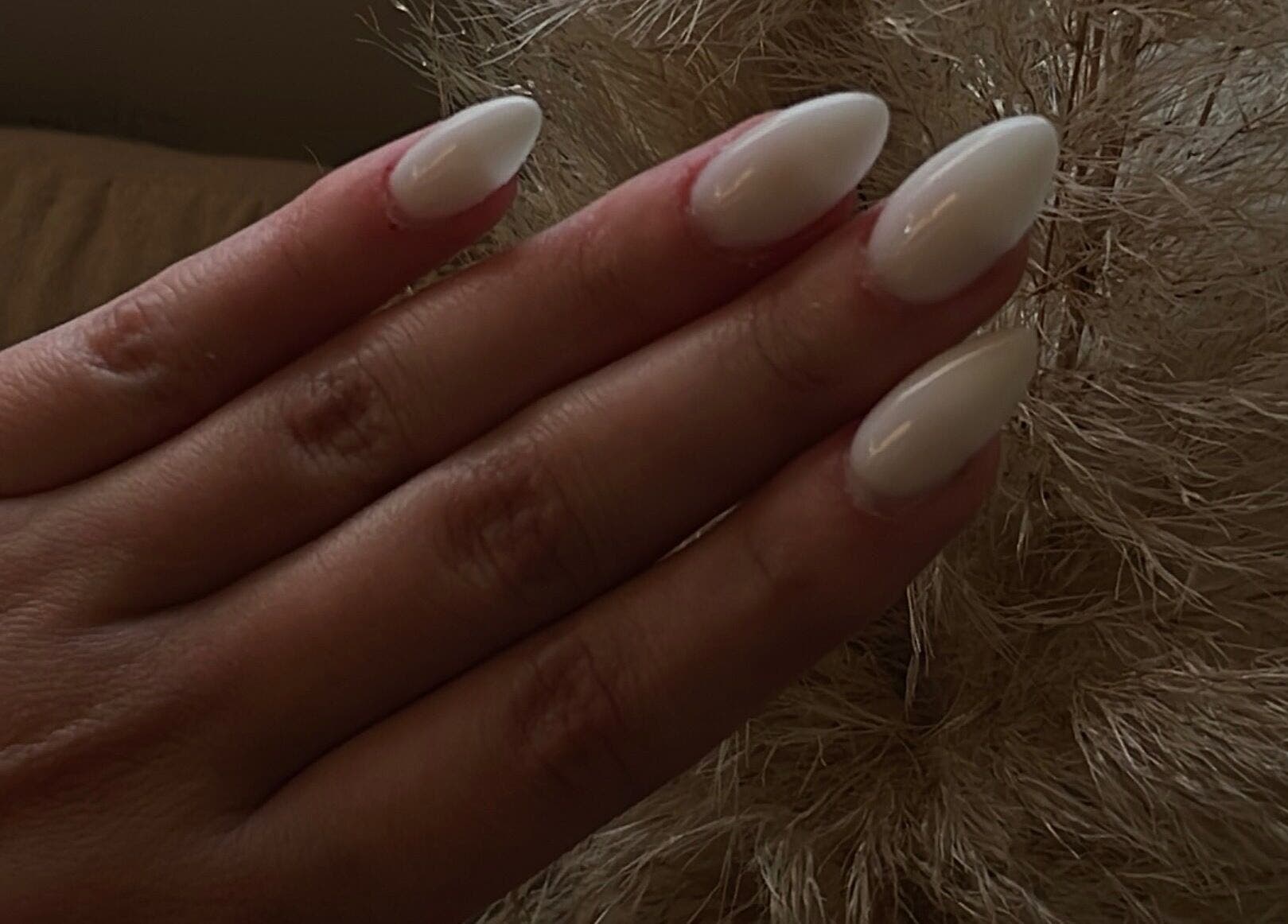 Sleek white manicure at Define Artistry Nail Bar, Gqeberha, Eastern Cape, ZA, showcasing expert nail artistry.