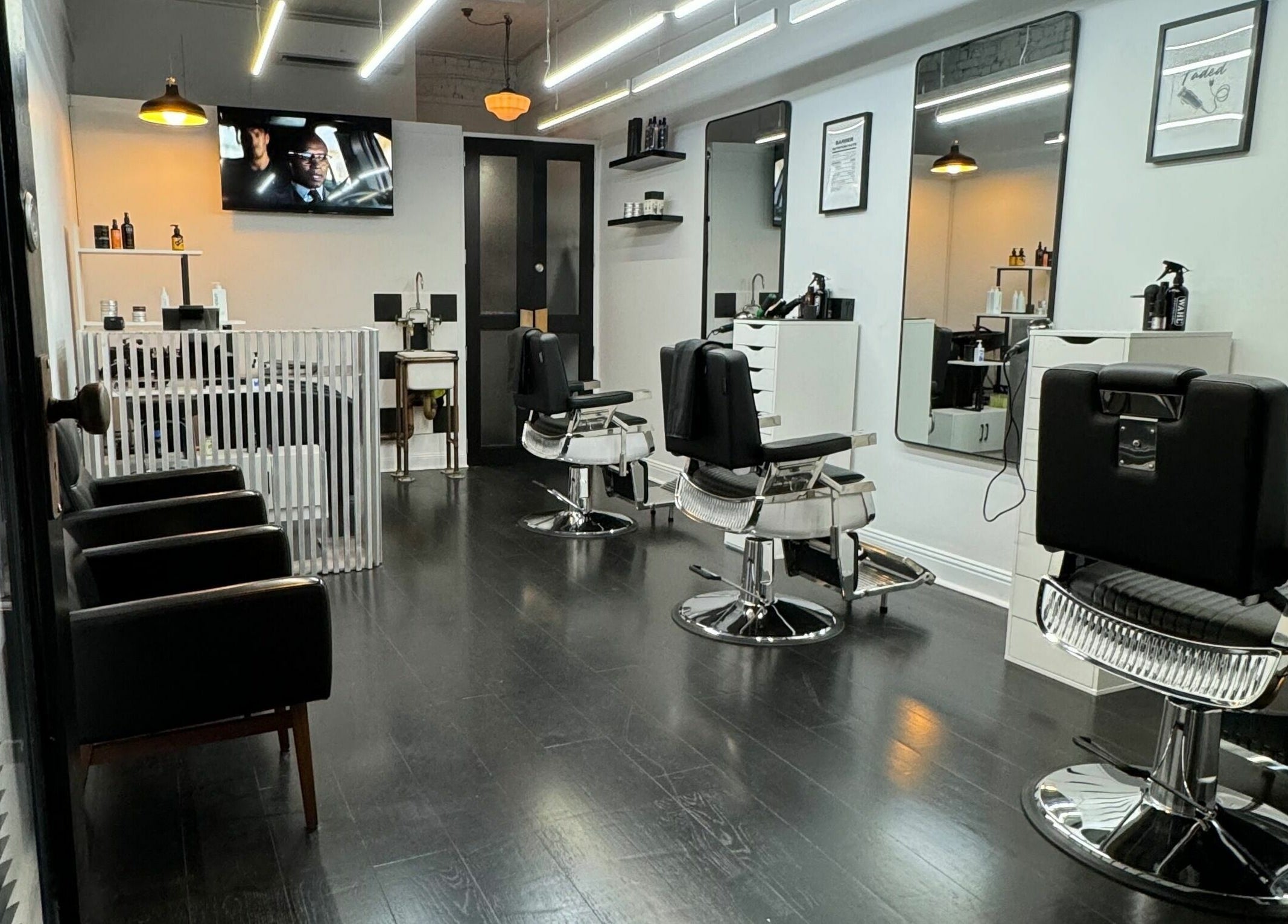 Interior view of Sleek Back salon in Melbourne, Victoria, AU showcasing stylish barber chairs and sleek decor.