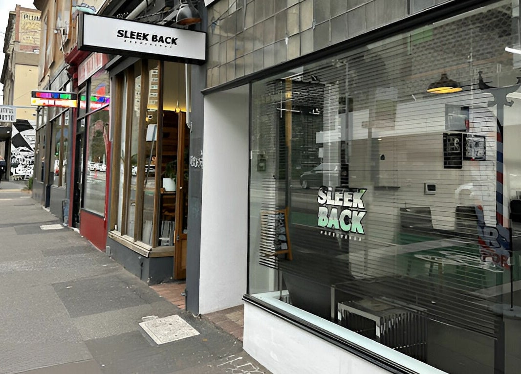 Exterior view of Sleek Back at Melbourne, Victoria, AU showcasing modern salon design.