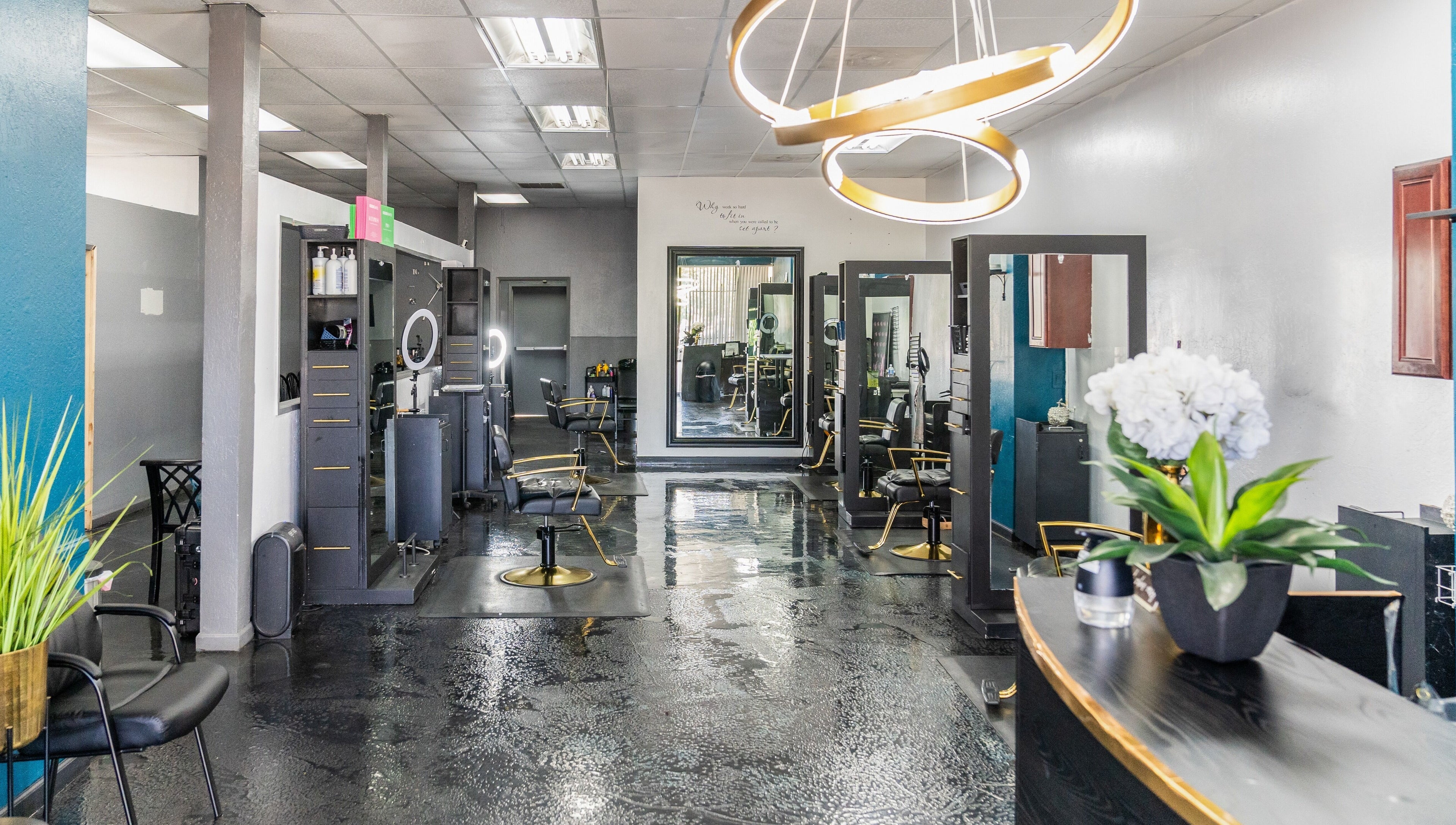Modern styling area at Beauti Logic in Antioch, California, US with sleek chairs and elegant decor.