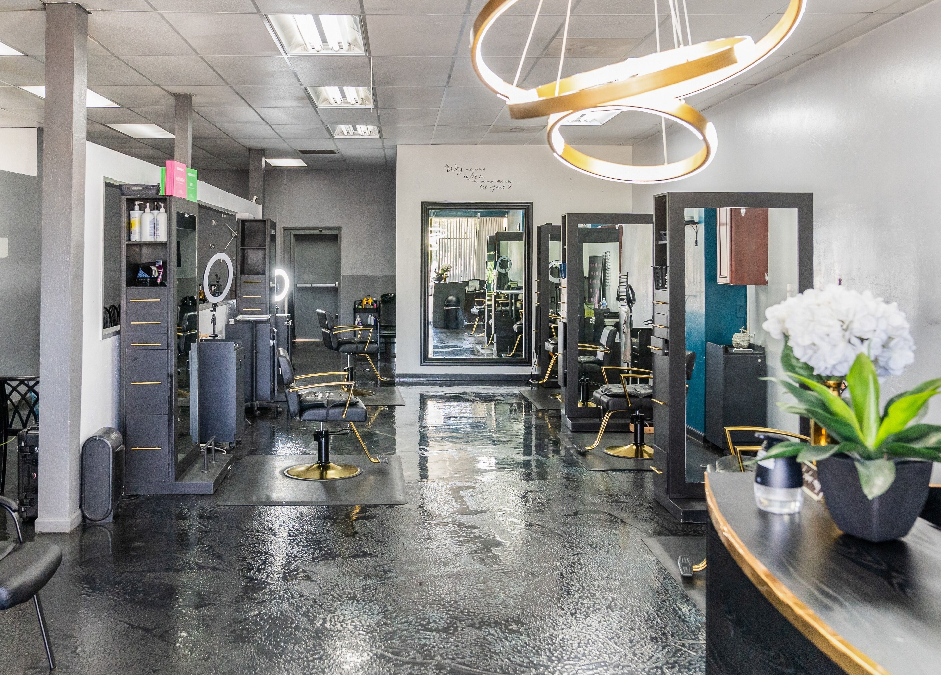 Modern styling area at Beauti Logic in Antioch, California, US with sleek chairs and elegant decor.