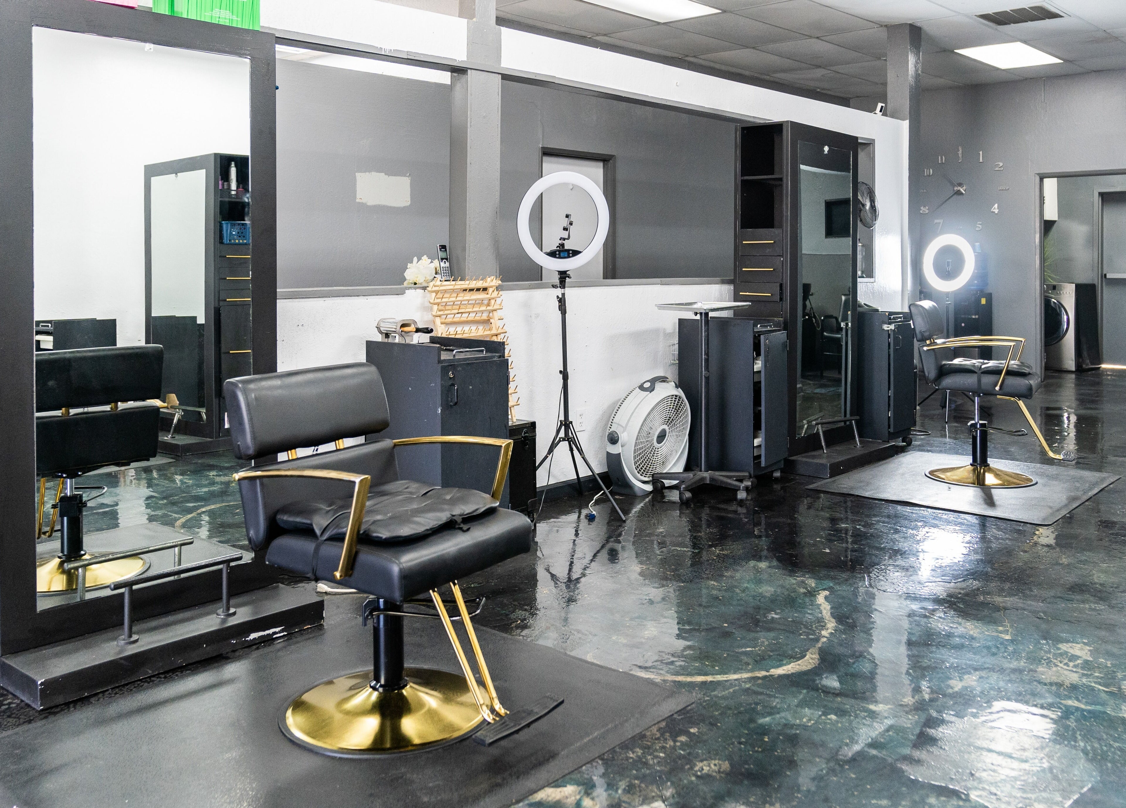 Sleek salon chairs and mirrors inside Beauti Logic, Antioch, California, US, offering modern beauty services.