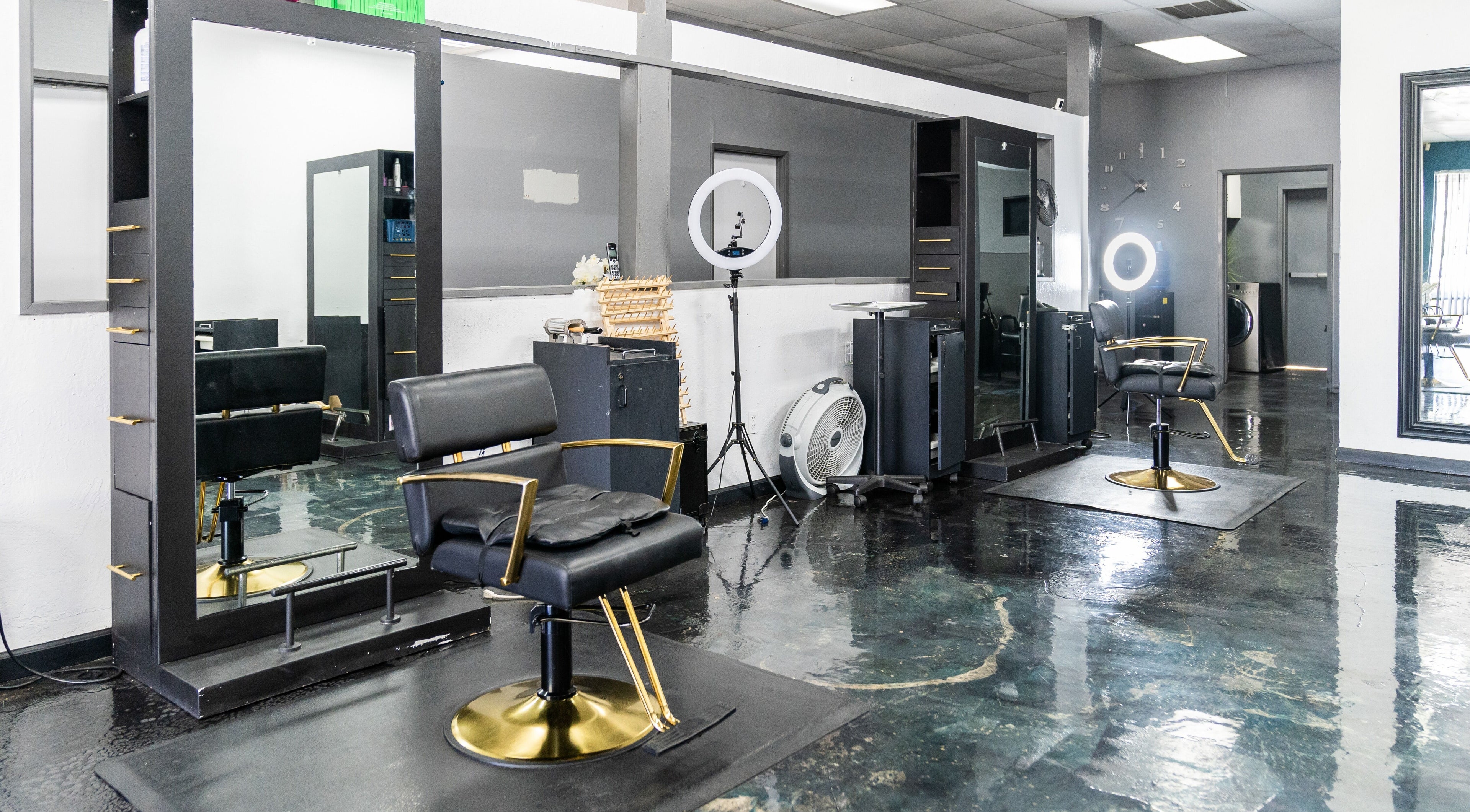 Sleek salon chairs and mirrors inside Beauti Logic, Antioch, California, US, offering modern beauty services.