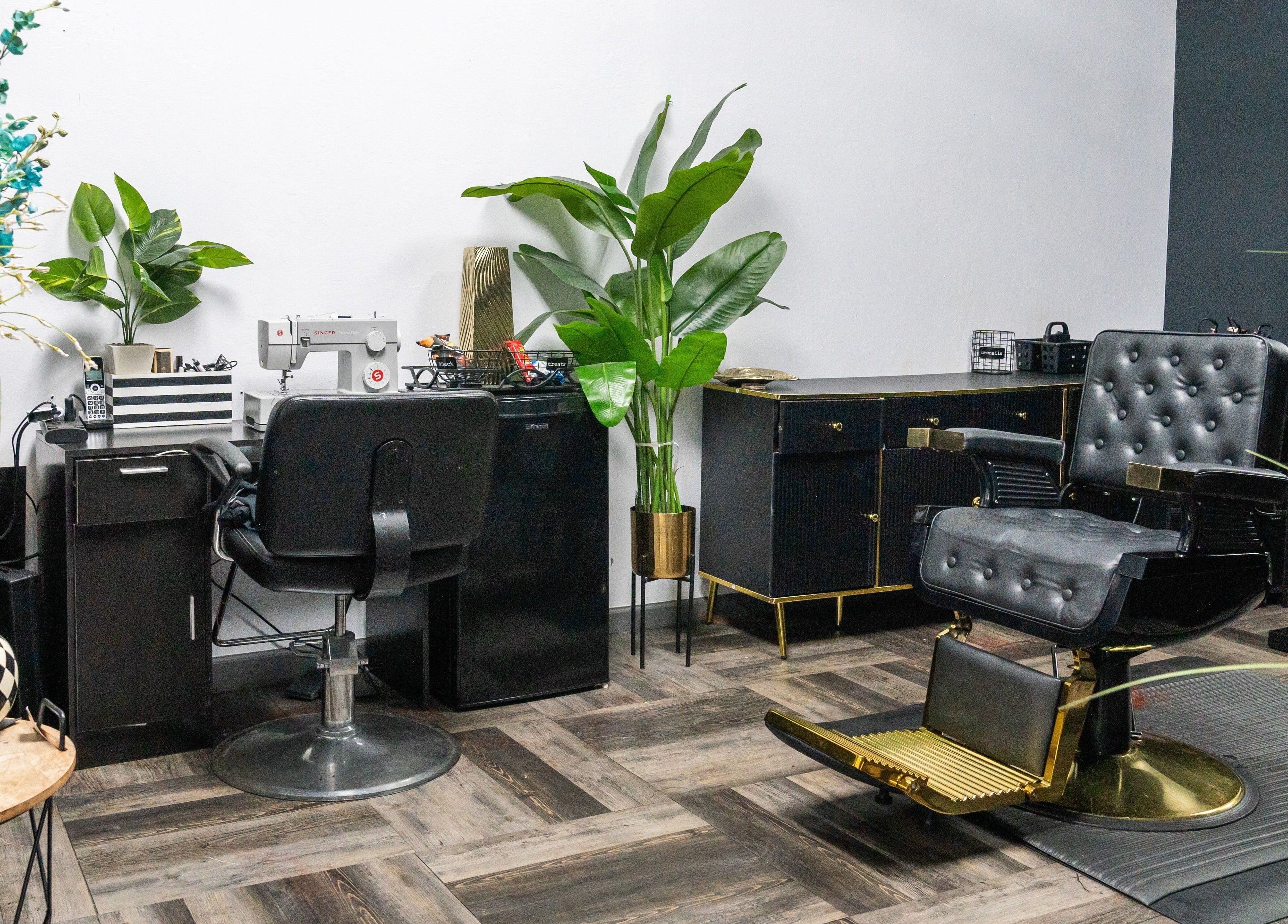 Stylish beauty chair and workspace at Beauti Logic, Antioch, California, US with modern decor and greenery.