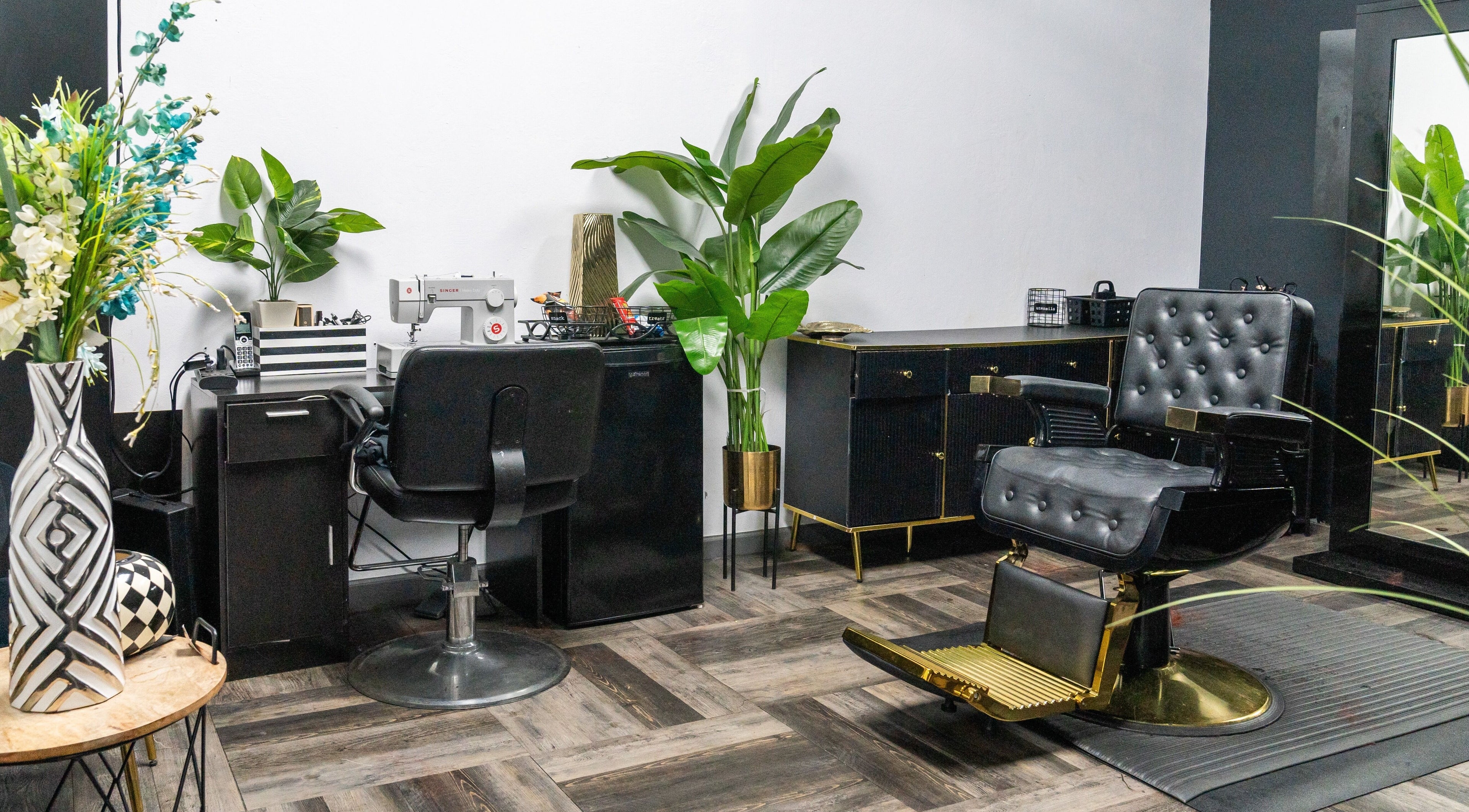 Stylish beauty chair and workspace at Beauti Logic, Antioch, California, US with modern decor and greenery.