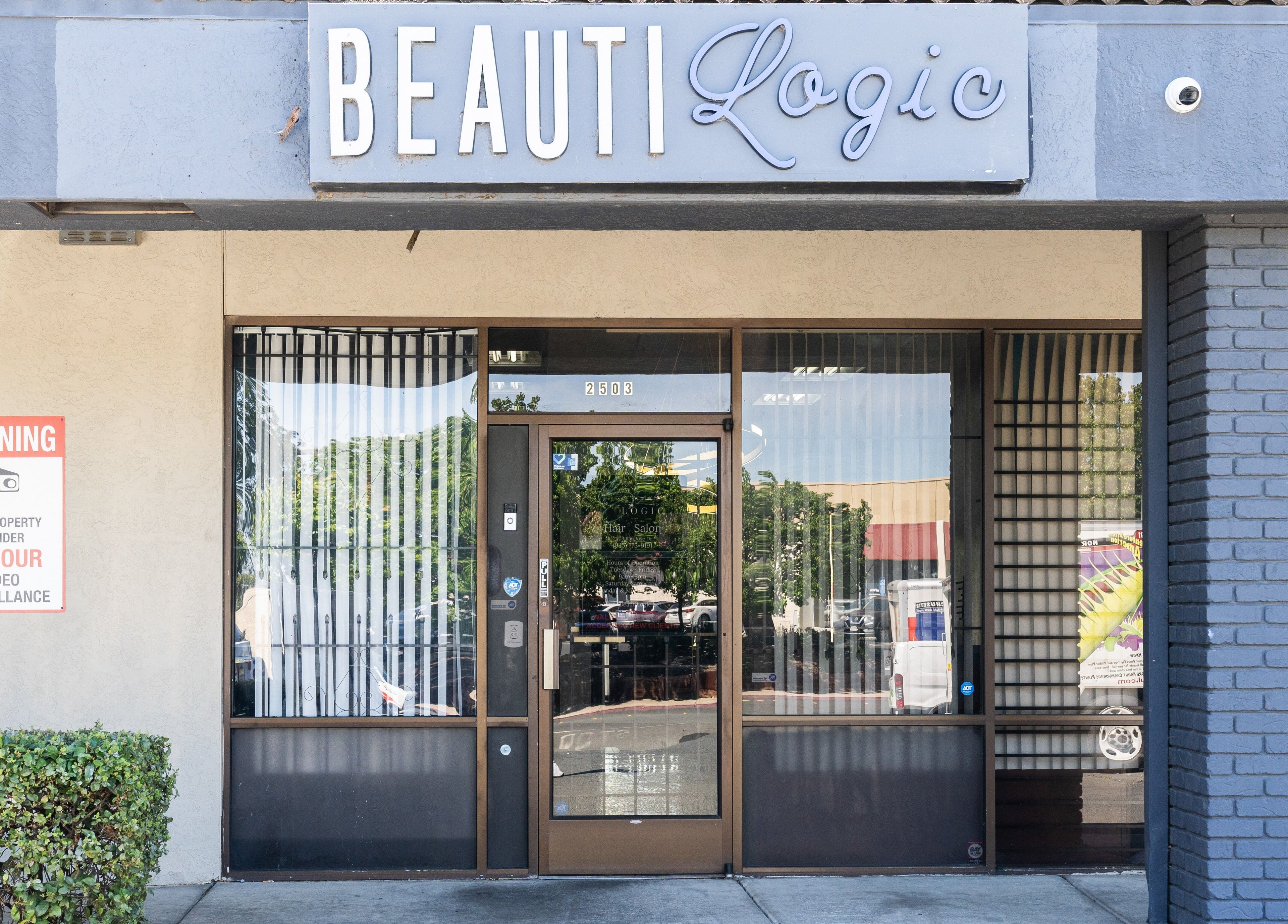 Entrance of Beauti Logic in Antioch, California, showcasing modern design and cozy atmosphere.