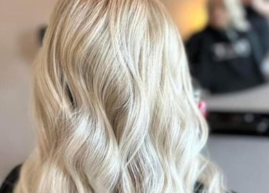 Elegant blonde waves styled at Ashleigh Lauren Hair, Kircubbin, Northern Ireland, GB.