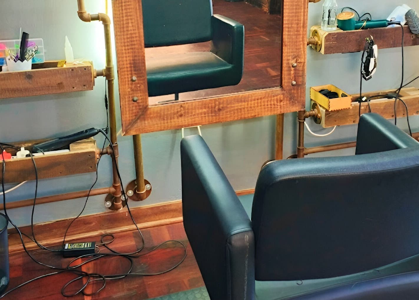 Stylish salon chair setup at Revive Hair Studio, Rustenburg, North West, ZA.