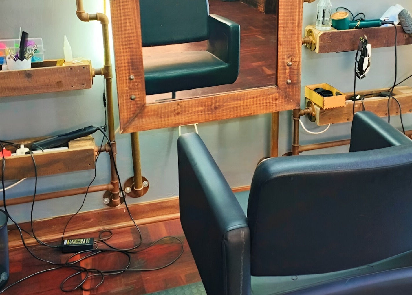 Stylish salon chair setup at Revive Hair Studio, Rustenburg, North West, ZA.