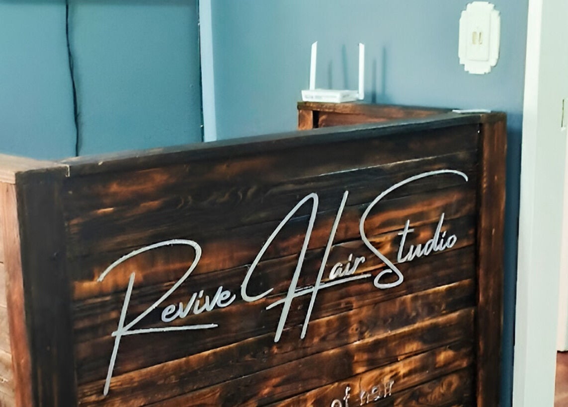 Entrance of Revive Hair Studio, stylish reception in Rustenburg, North West, ZA.