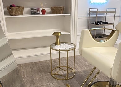 Elegant salon interior featuring chic furniture at Luxelooks, Porthcawl, Wales, GB.