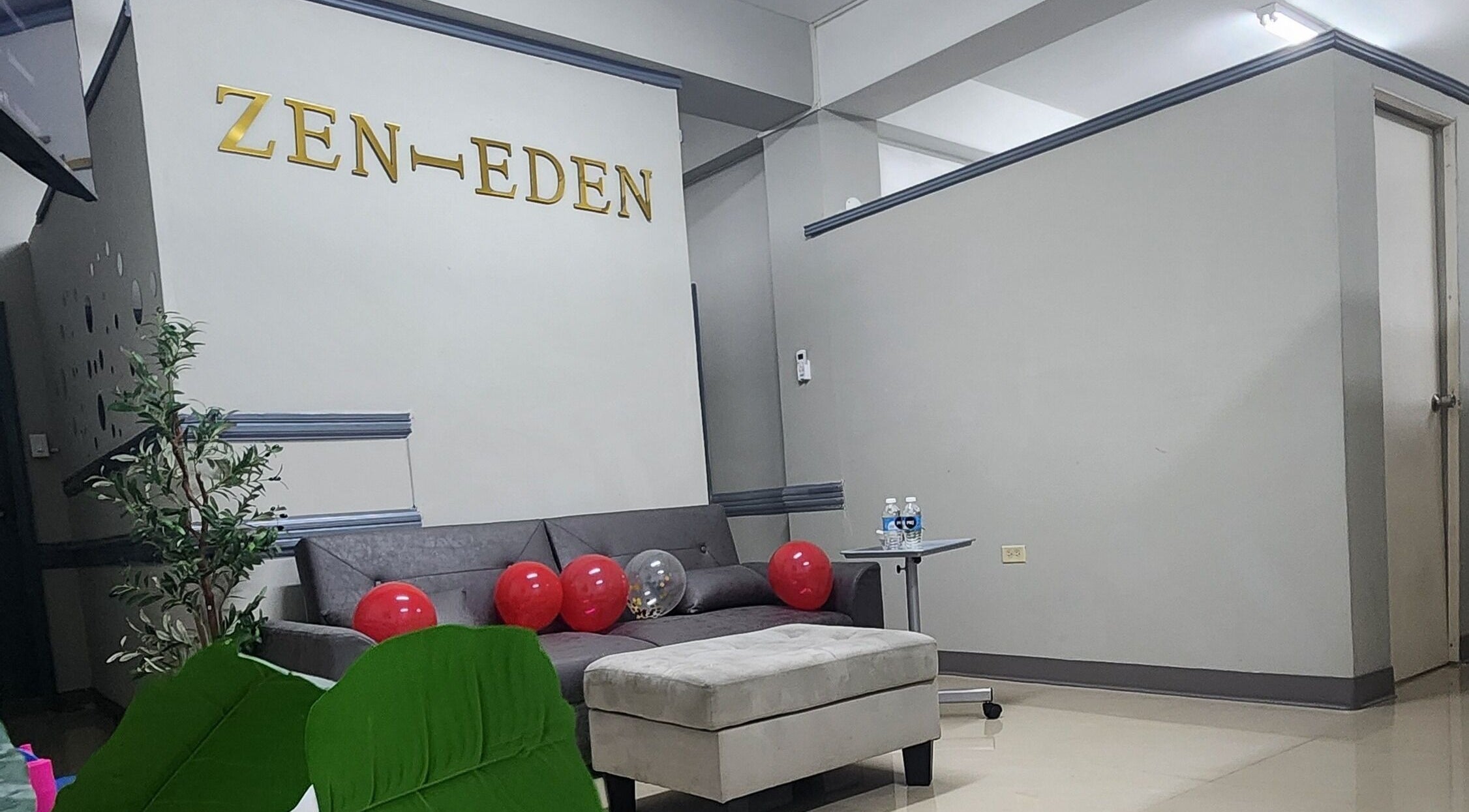 Welcoming lounge at Zen Eden Lounge and Spa, Montego Bay, St. James Parish, JM with elegant decor and comfy seating.