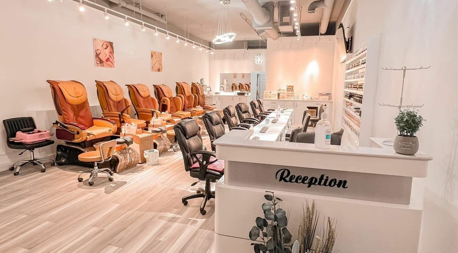 Luxurious seating at Lexi Nails & Spa, Airdrie, Alberta, CA, showcasing comfort and style in a calm ambiance.